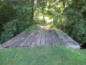 Country trails, crossing an old wooden bridge