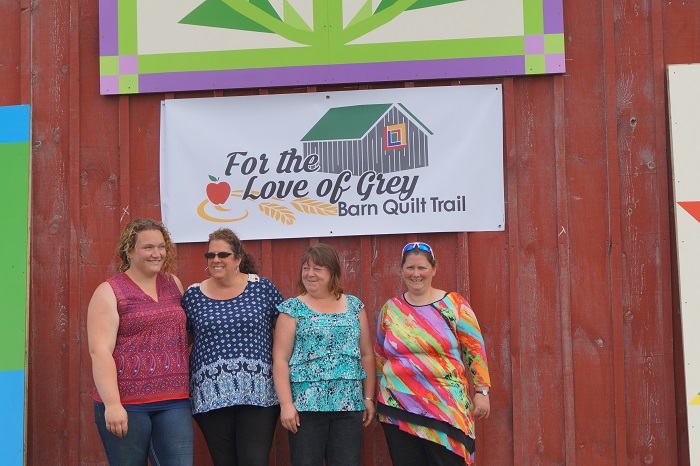 The "Love the Love of Grey" Barn Quilts team